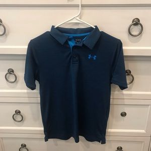Blue Under Armour shirt.